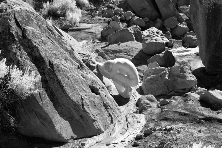 B&W Photo Red Rocks New Mexico Figure in Dried Riverbed © Laurie Klein